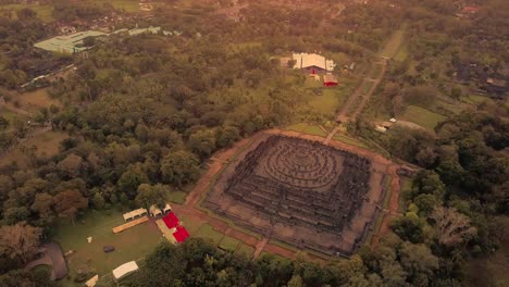 Borobudur-temple-aerial-view-at-sunrise-a-UNESCO-site-and-World-largest-Buddhist-temple,-Indonesia