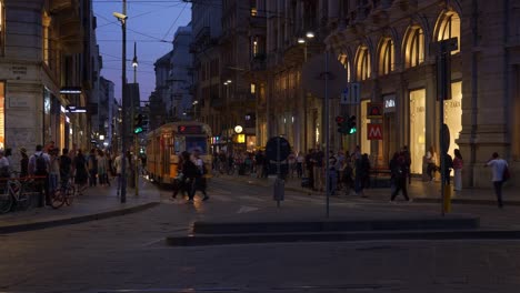 Italy-night-illuminated-milan-famous-tram-traffic-street-crossroad-panorama-4k