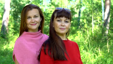 Portrait-of-two-smiling-women.