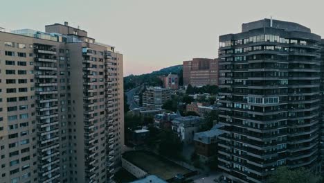 Aerial-footage-of-rundown-highrises-during-a-hazy-summer-day