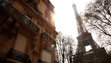 Eiffel-Tower-Next-To-Building