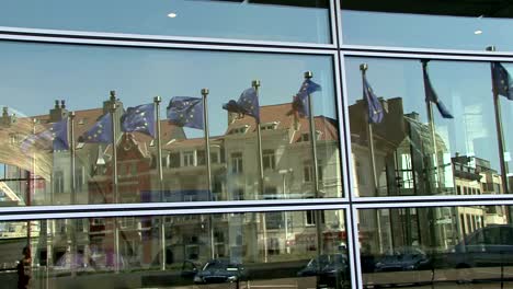 Reflection-of-european-flags-in-the-wind