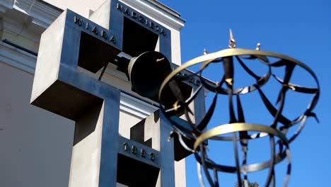 ringing-church-bell-mounted-in-a-cross