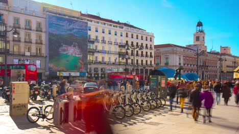 madrid-day-light-puerto-del-sol-tourist-walk-and-bicycle-station-4k-time-lapse-spain