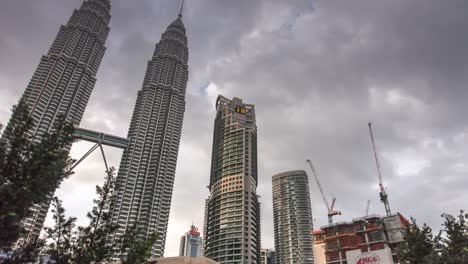 malaysia-evening-kuala-lumpur-famous-petronas-twin-towers-side-construction-4k-time-lapse
