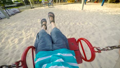 POV-footage-of-three-kids-playing-in-a-playground