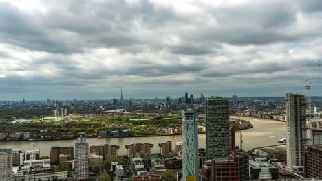 Aerial-Panorama-Of-Thames-River-And-Canary-Wharf-Business-District-In-London