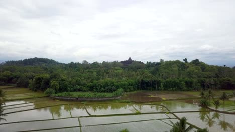 Aerial-view-drone-shot-of-Borobudur-temple-in-Java-at-sunrise,-Indonesia-Travel-religion-drone-concept-4K-resolution