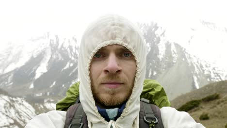 Young-man-in-the-mountains-of-Nepal.-Manaslu-circuit-trek,-4500-m-altitude.