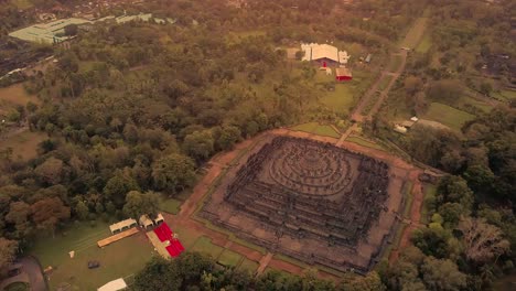 Borobudur-temple-aerial-view-at-sunrise-a-UNESCO-site-and-World-largest-Buddhist-temple,-Indonesia