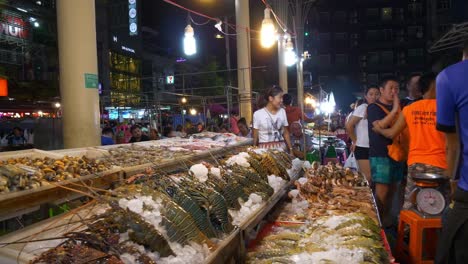 famous-night-time-phuket-island-street-food-market-walking-slow-motion-panorama-4k-thailand