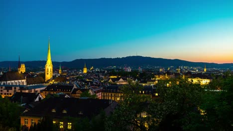 switzerland-night-sunset-illumination-zurich-famous-rooftop-cityscape-panorama-4k-timelapse