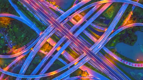 Aerial-view-Time-lapse-of-the-expressway,-motorway-and-highway-in-the-detail-of-circus-intersection