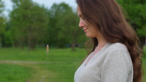 Half-face-portrait-of-romantic-in-summer-park