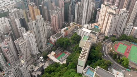 Aerial-tilt-up-shot-of-Hong-Kong-island