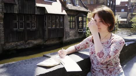 Foxy-hair-girl-leisure-on-riverbank