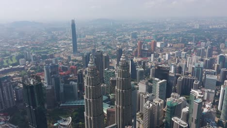 soleado-día-Kuala-Lumpur-ciudad-centro-panorama-aéreo-4k-Malasia