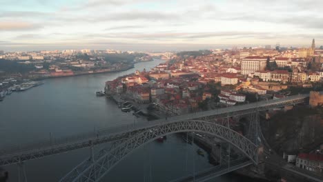 Aerial-view-of-Luis-I-bridge-and-city-of-Porto-during-sunset/sunrise