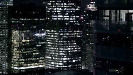 4K-Exterior-establishing-shot-of-a-modern-office-building-at-night.