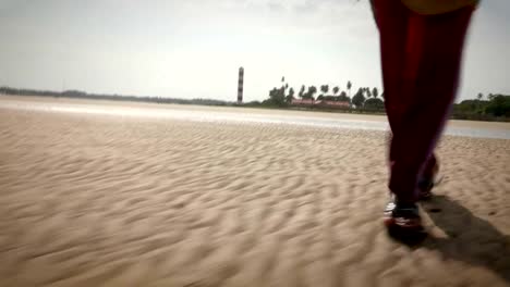 Man-walking-by-the-beach