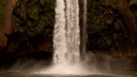 timelapse-pan-up-Ouzoud-Waterfalls-located-in-the-Grand-Atlas-village-of-Tanaghmeilt,-in-the-Azilal-province-in-Morocco,-Africa