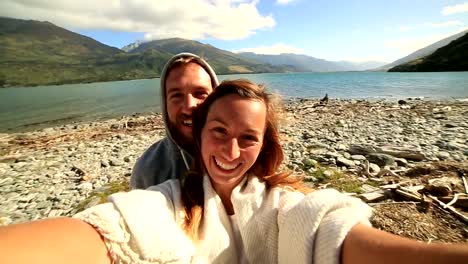 Self-portrait-of-a-young-couple-by-the-lake-shore