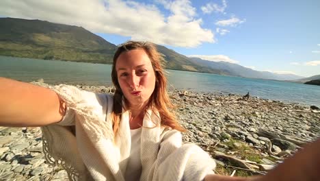 Self-portrait-of-a-young-woman-by-the-lake-shore