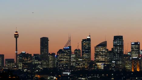 Sydney-Skyline-on-sunset-at-dusk,-featuring-Smog-over-the-Sydney-CBD