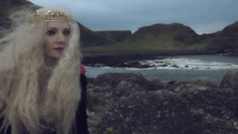 4k-Fantasy-Shot-on-Giant's-Causeway-of-a-Queen-Walking-Away