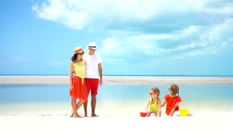 Young-family-on-beach-vacation