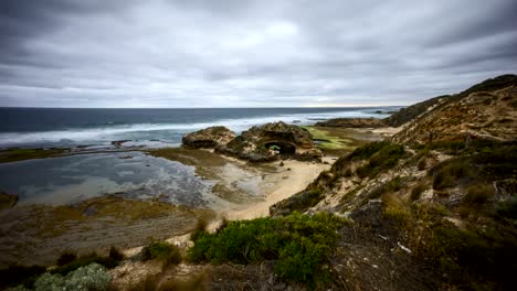 cloudy-sunset-at-unique-rock-formation-along-the-coastline---The-London-Bridge-at-portsea