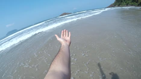 Men-walking-in-Brazilian-Beach