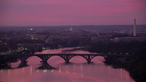 Flying-over-Potomac-River-with-Washington-Monument-and-Capitol-in-distance.