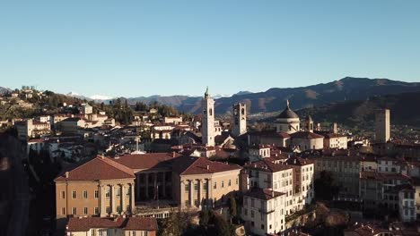 Drone-aerial-view-of-Bergamo---Old-city.-One-of-the-beautiful-town-in-Italy.-Landscape-on-the-city-center-and-its-historical-buildings-during-a-wonderful-blu-day