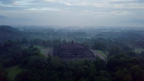 Aerial-view-drone-shot-of-Borobudur-temple-in-Java-at-sunrise,-Indonesia-Travel-religion-drone-concept-4K-resolution