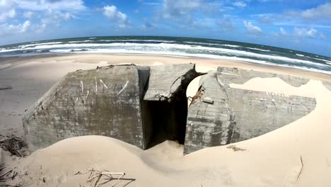 Ruin-of-concrete-Bunker,-Atlantic-Wall,-Second-World-War,-memorial,-North-Sea,-4K