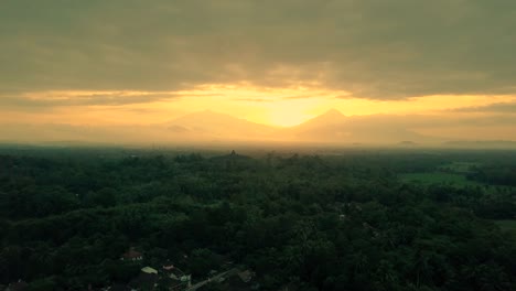 Borobudur-temple-aerial-view-at-sunrise-a-UNESCO-site-and-World-largest-Buddhist-temple,-Indonesia