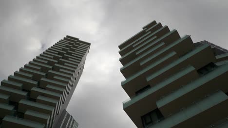 Italy-milan-city-modern-block-buildings-up-view-slow-motion-panorama-4k