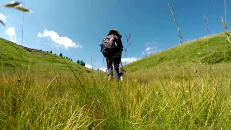 Family-on-a-trekking-day-in-mountain,-video-footage-4K