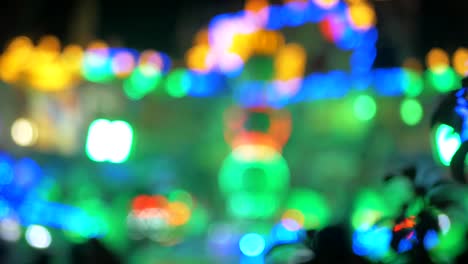 Holiday-lights.-The-festive-mood.-Background.-New-Year.-Christmas.-Fair.-Amusement-park.