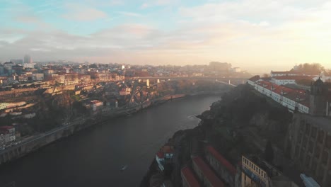 Aerial-view-of-city-of-Porto-and-Douro-river-during-sunset/sunrise