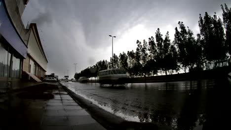 asphalt-road-and-trees-with-gray-guillaume-clouds