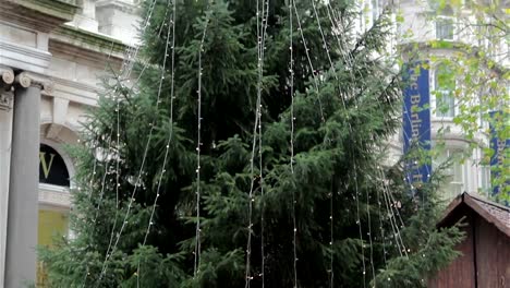 Christmas-Tree-Tilt-on-Busy-Birmingham-High-Street-with-Xmas-Lights