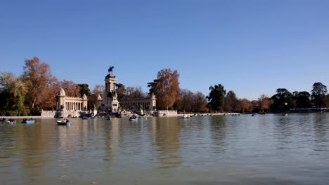 Lake-In-Retiro-Park-Front-Monument-To-Alfonso-XII-In-Madrid,-Spain
