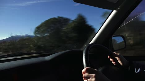 Woman-drive-in-Tongariro-National-Park