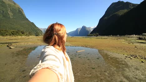 Selfie-point-of-view,-woman-in-mountain-scenery