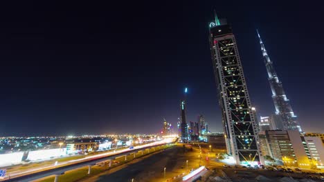 Nacht-Beleuchtung-Dubai-Business-Bay-Verkehr-Straße-Panorama-4-k-Zeit-verfallen-Vereinigte-Arabische-Emirate