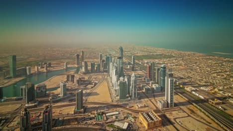 sunny-day-dubai-city-industrial-part-roof-top-panorama-4k-time-lapse-united-arab-emirates