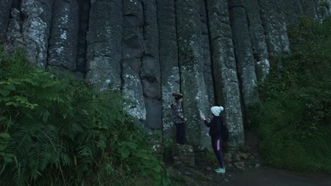 4k-Shot-of-Tourists-on-Giant's-Causeway,-Northern-Ireland