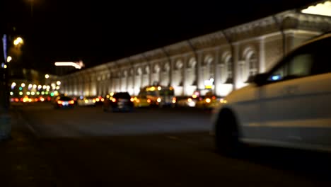 Concept-of-the-night-city-traffic-on-Manezh-Square-near-the-Kremlin-in-blur